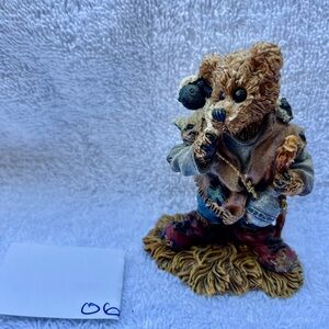 Boyd’s bear carrying a lamb